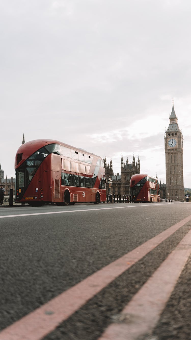 Red Buses On Street With Big Ben Behind