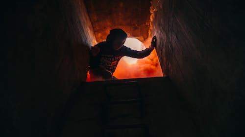 Person Holding Concrete Wall