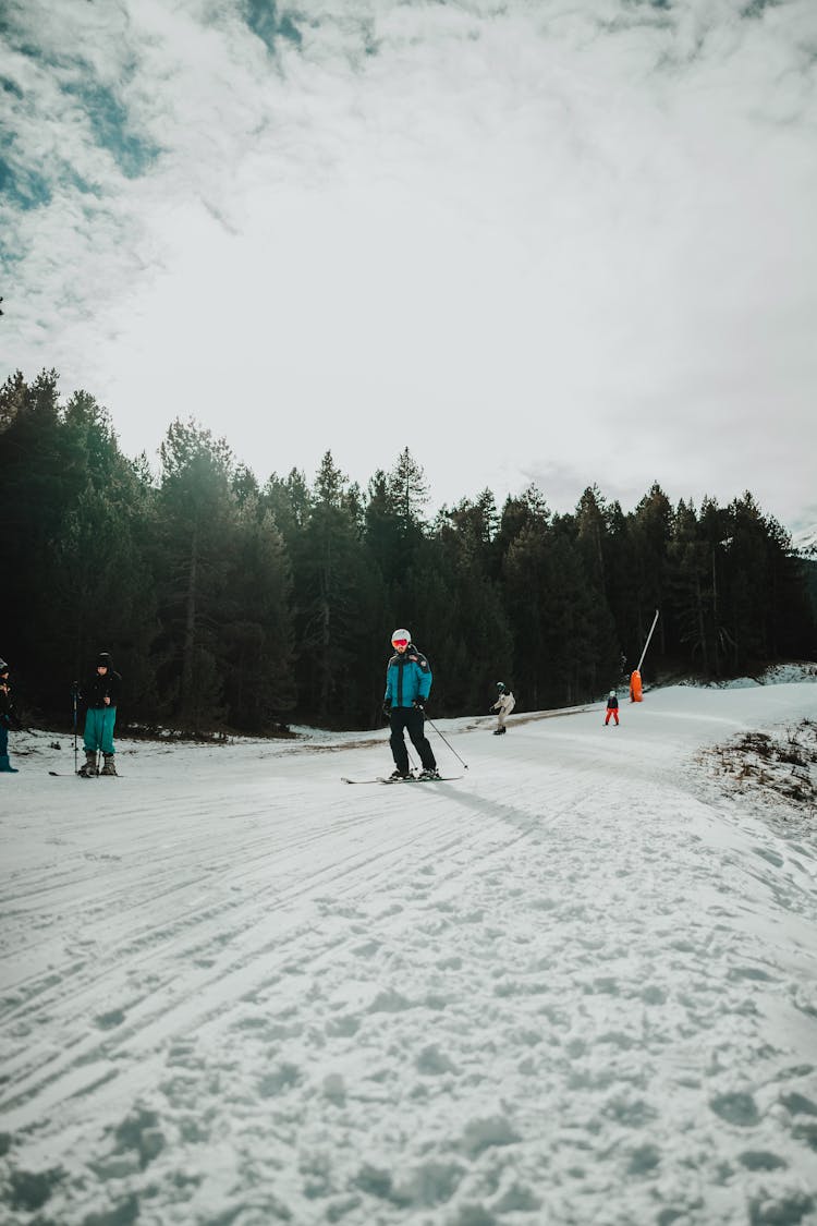 People Skiing On Ski Slope