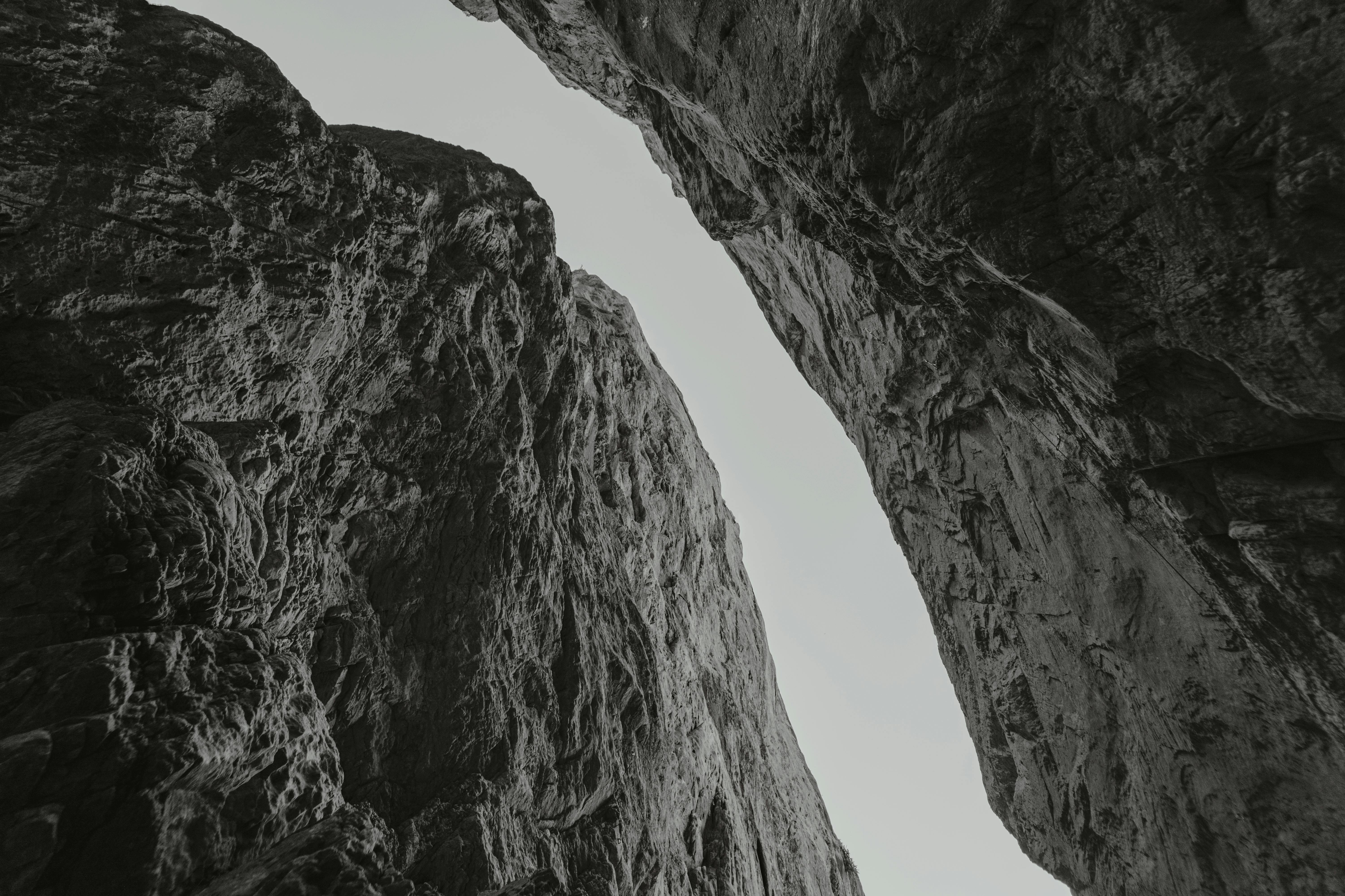 Stunning black and white photograph of a canyon in Mount Charleston, showcasing rugged textures and formations.