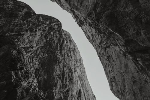 Free Stunning black and white photograph of a canyon in Mount Charleston, showcasing rugged textures and formations. Stock Photo