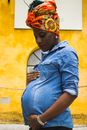 Standing Woman Holding Her Belly