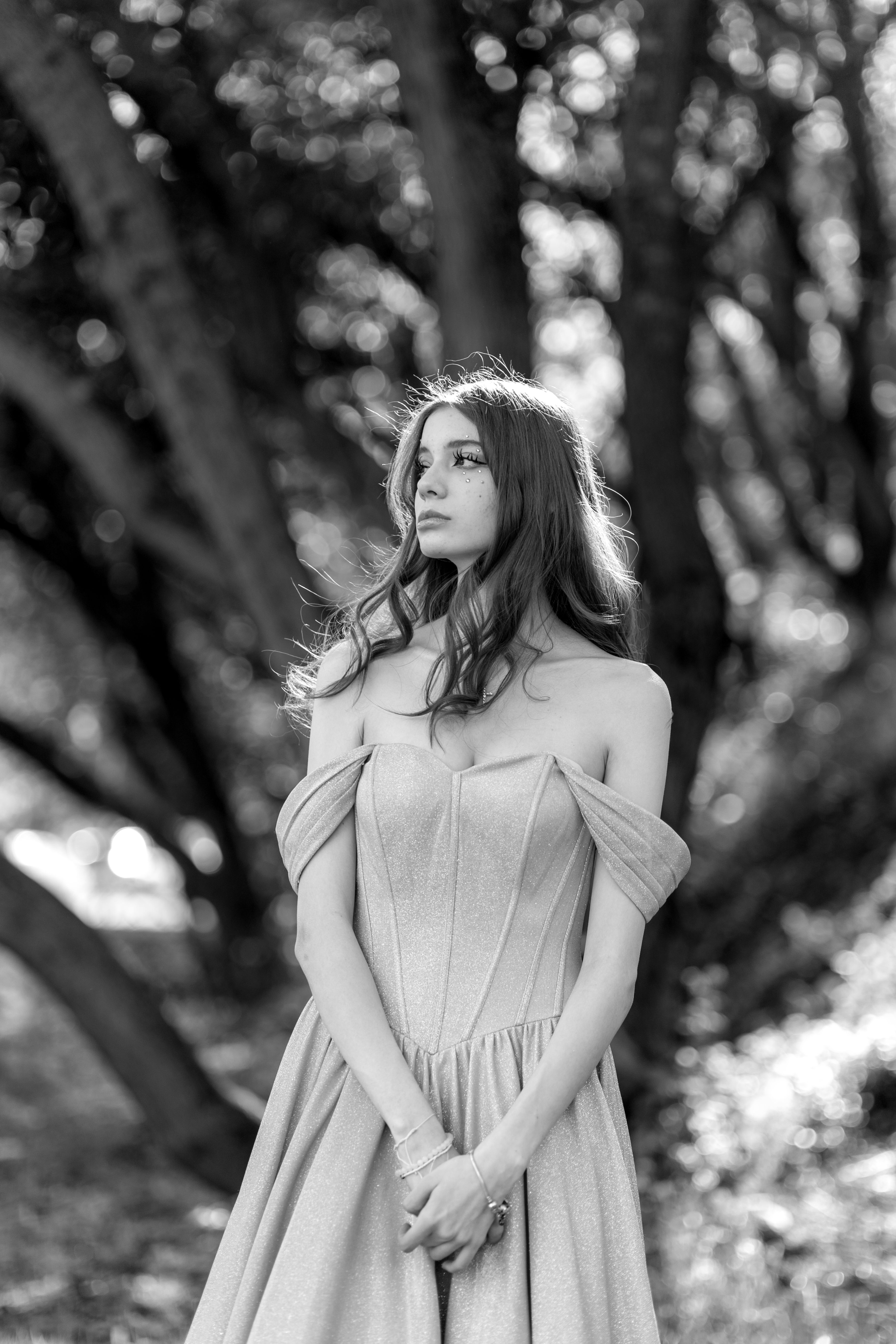 A woman in a dress standing in the woods · Free Stock Photo
