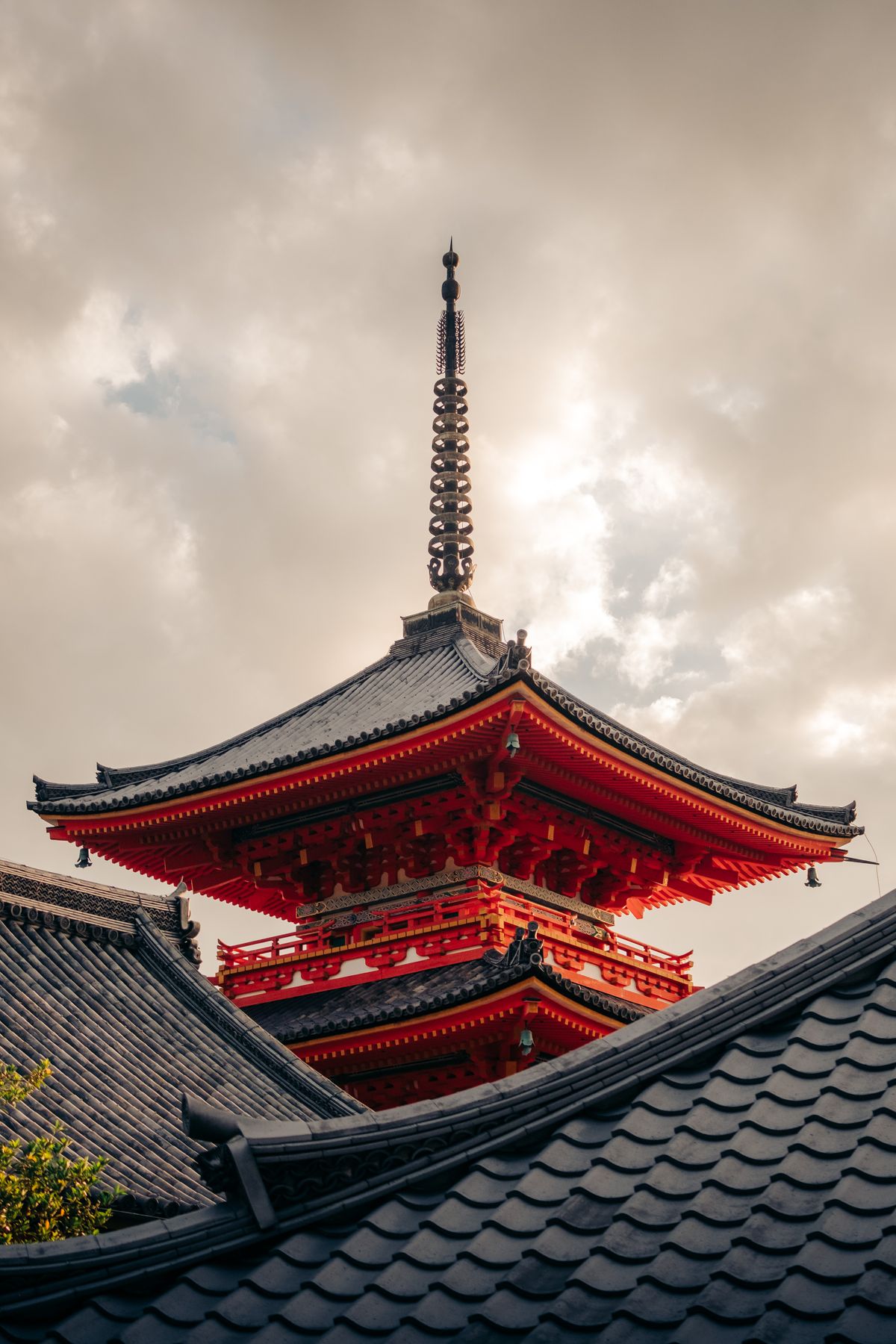 Red and Black Temple Surrounded by Trees Photo · Free Stock Photo