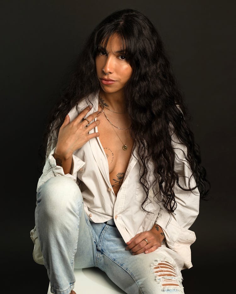 Studio Shot Of A Young Woman With Long Hair