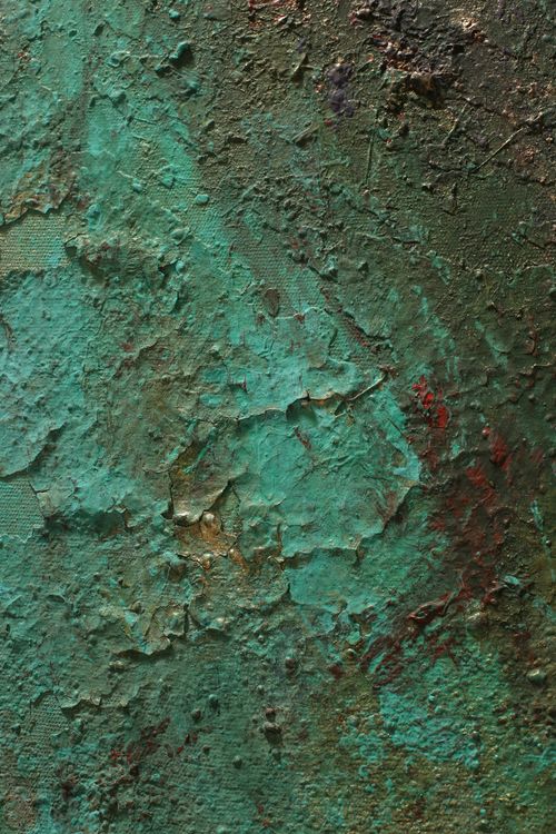 Free Close-up view of a weathered wall with rich green textures and rustic details. Stock Photo