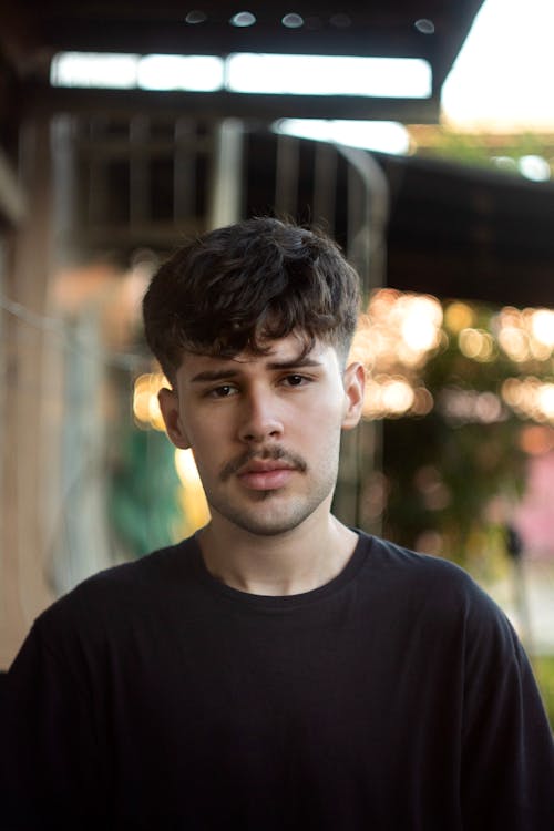 Young Man in a Black T-Shirt 