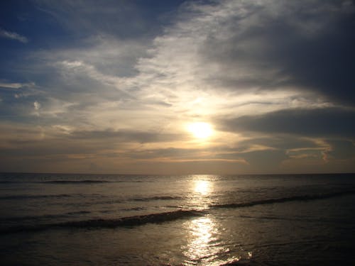 Gratis stockfoto met oceaan, strand, zonsondergang