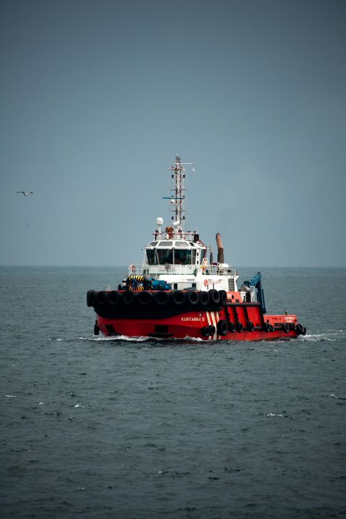 Free A tugboat sails through Istanbul's sea, showcasing maritime activity. Stock Photo