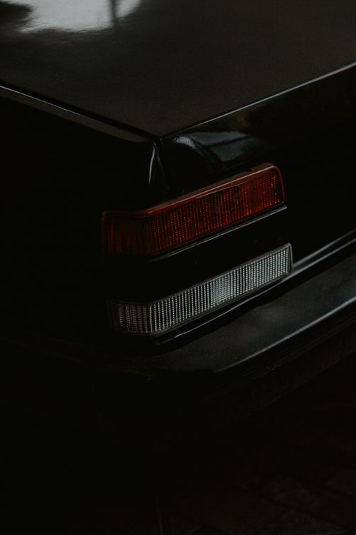 Free Detailed close-up of a black car's taillight taken in Brazil, showcasing automotive design. Stock Photo