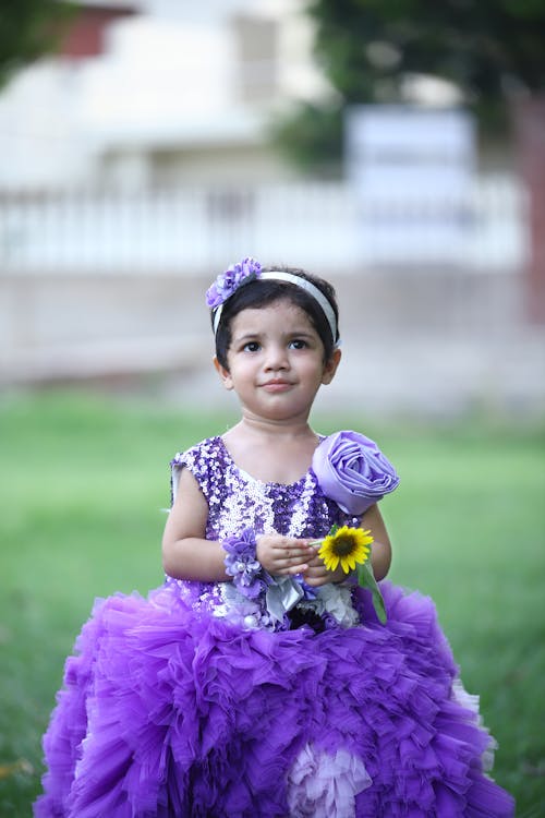 Child Model in Purple Dress