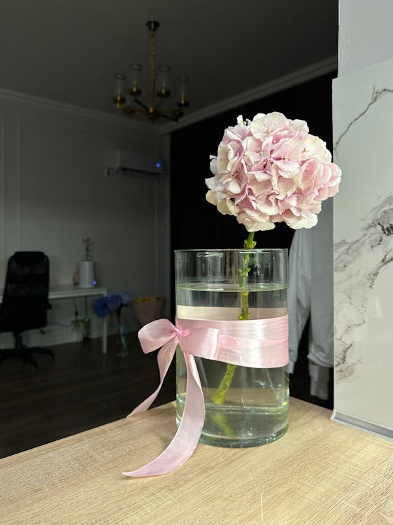 A Pink Hydrangea in a Glass Vase on the Table · Free Stock Photo