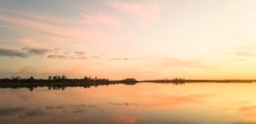Free stock photo of cloudy skies, golden sunset, mirror Stock Photo
