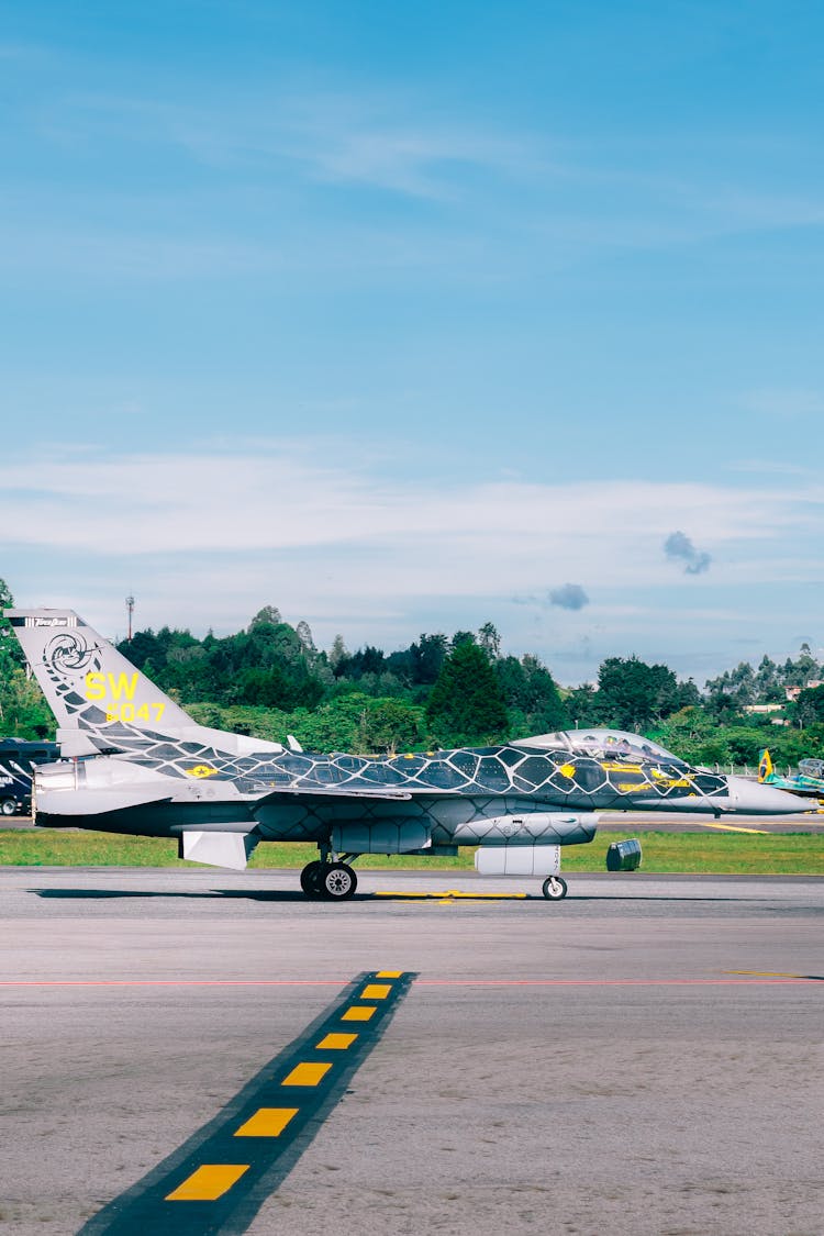 Military Airplane On Airstrip