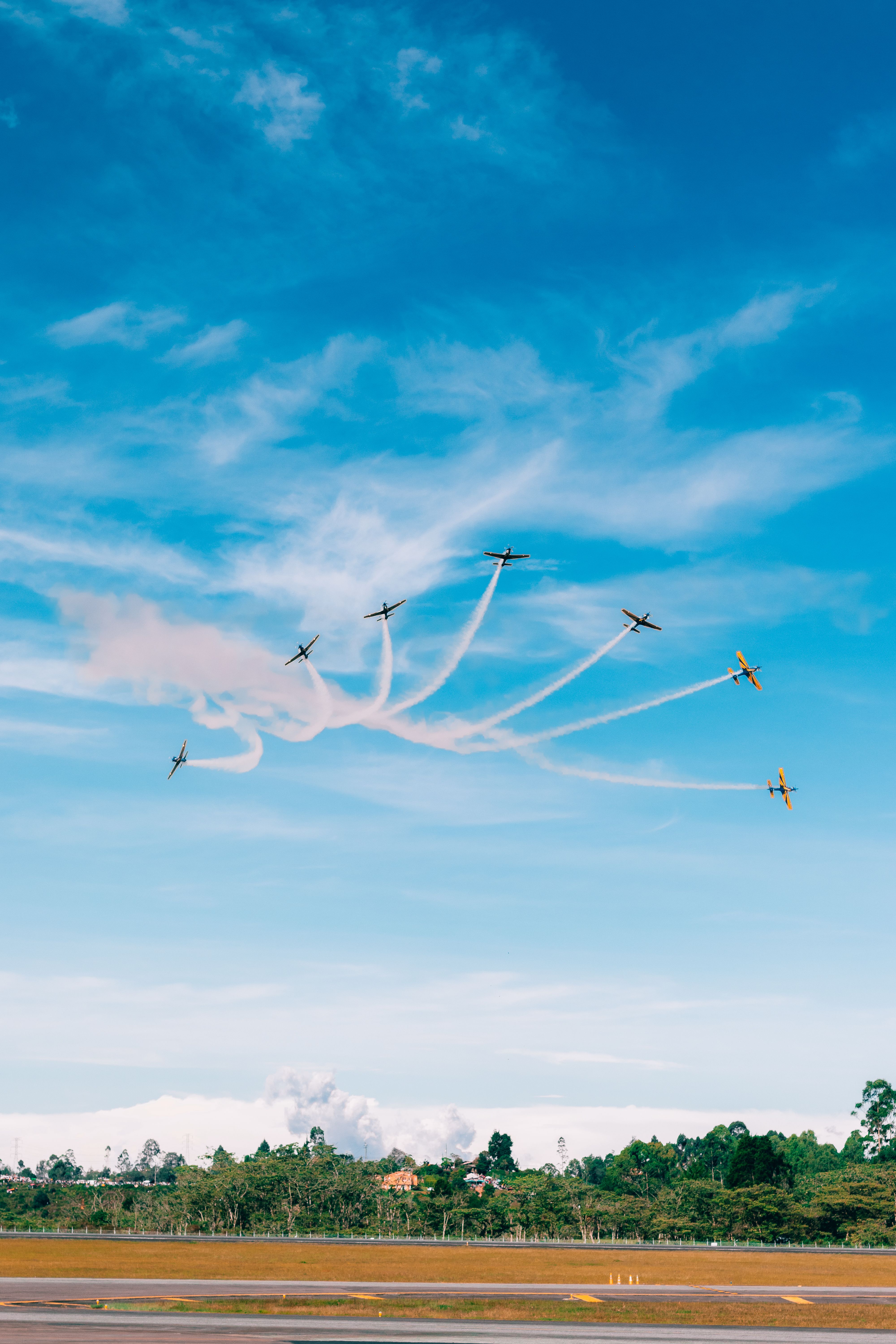 Planes during an Air Show against Blue Sky · Free Stock Photo
