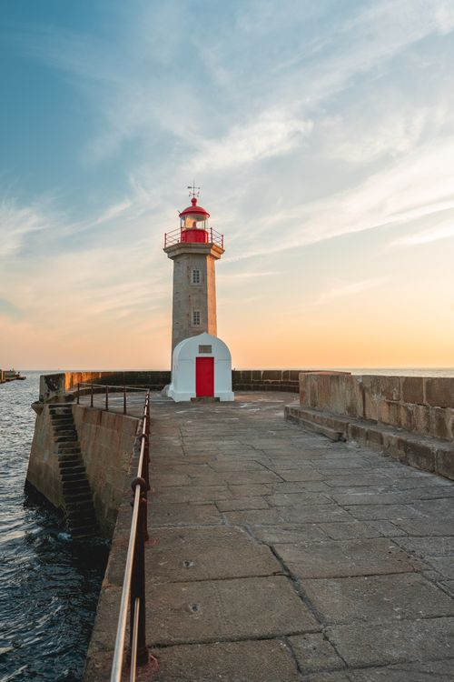 Free Discover the beautiful sunset at Farolim de Felgueiras Lighthouse in Porto, Portugal. Stock Photo