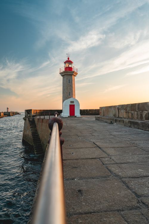 Free Stunning view of Farolim de Felgueiras Lighthouse at sunset, Porto, Portugal. Stock Photo