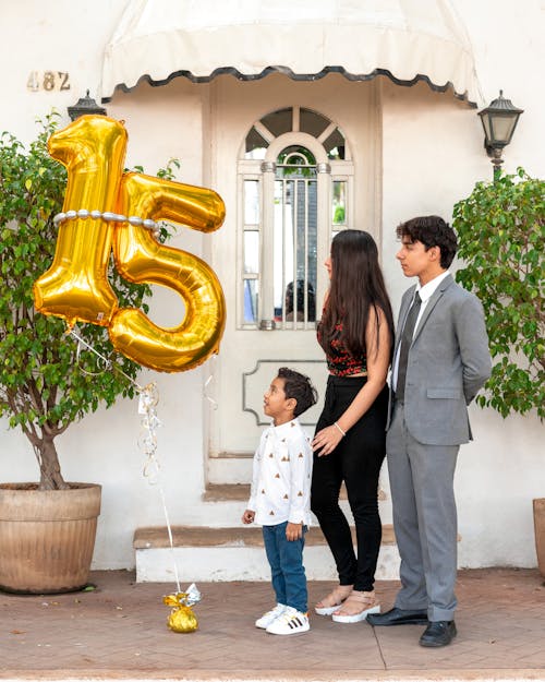 Free Siblings with Birthday Balloons Stock Photo