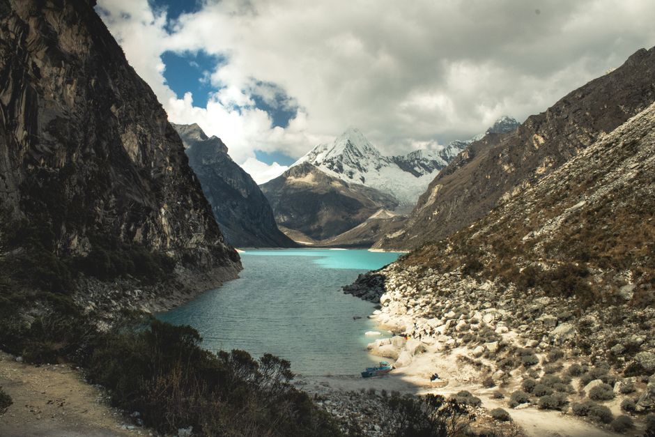 2Day-Luxury VIP Helicopter Tour to Cordillera Blanca & Huayhuash - Beautiful landscape of turquoise lake surrounded by the Andes mountains in Huaraz, Peru.