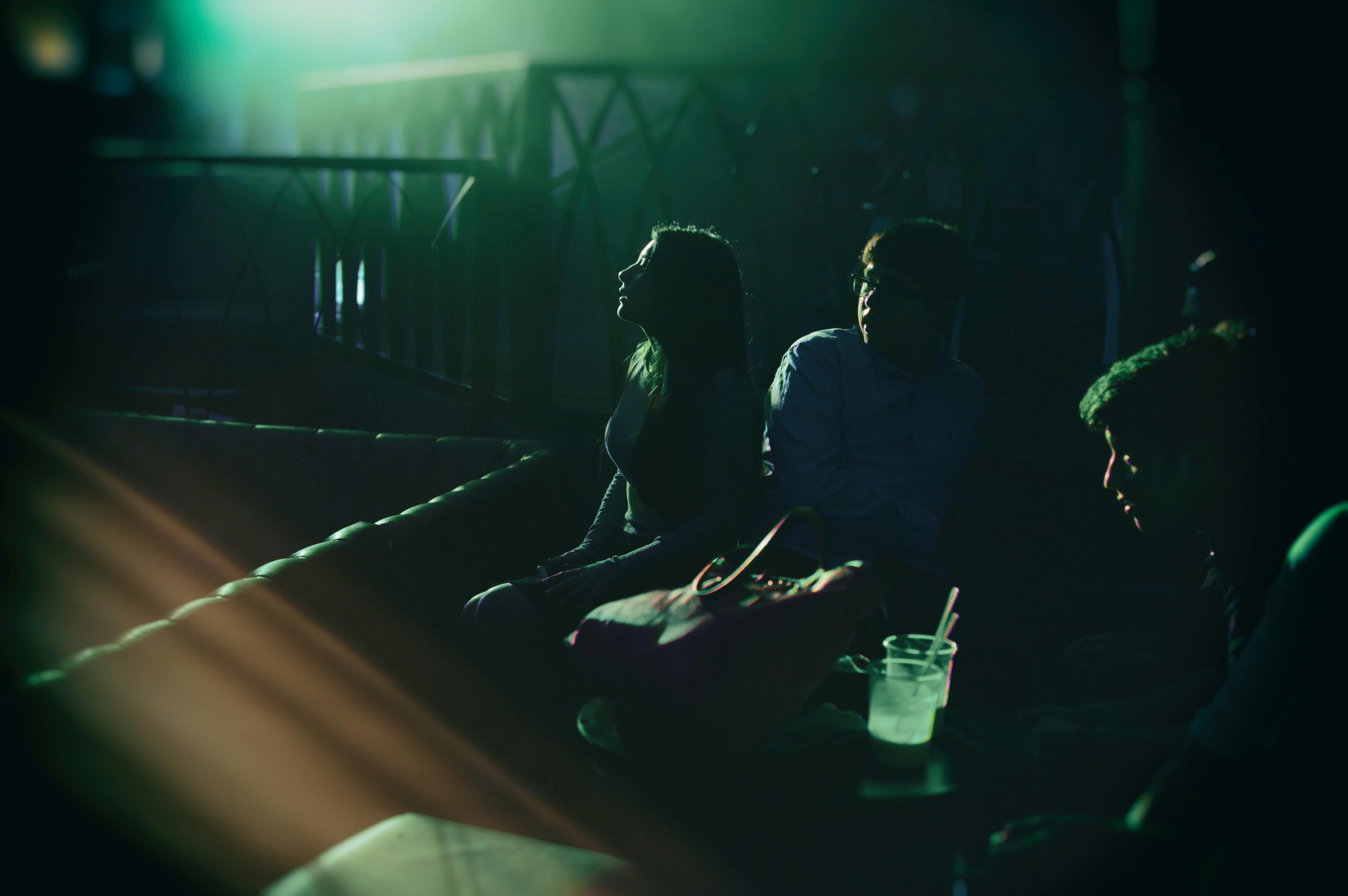 group of people sitting near table