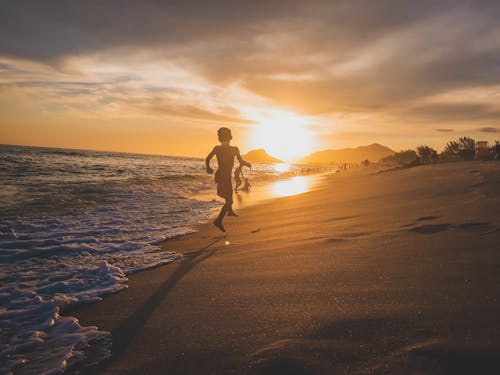 Boys Playing on Seashore