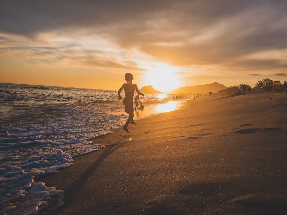 Boys Playing on Seashore