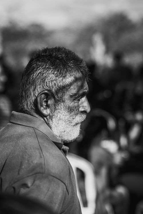 Free Close-up black and white portrait of an elderly man with a beard, showcasing deep expression and character. Stock Photo