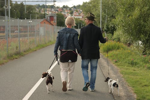 Two People with Dogs 