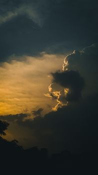 A breathtaking view of dramatic clouds during twilight in Jaipur, India, showcasing nature's beauty.