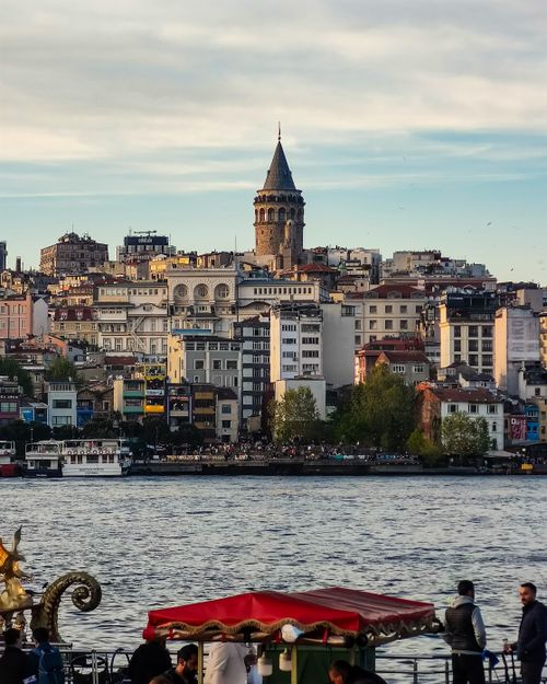 Free Explore the iconic Galata Tower and vibrant cityscape along Istanbul's bustling waterfront. Stock Photo