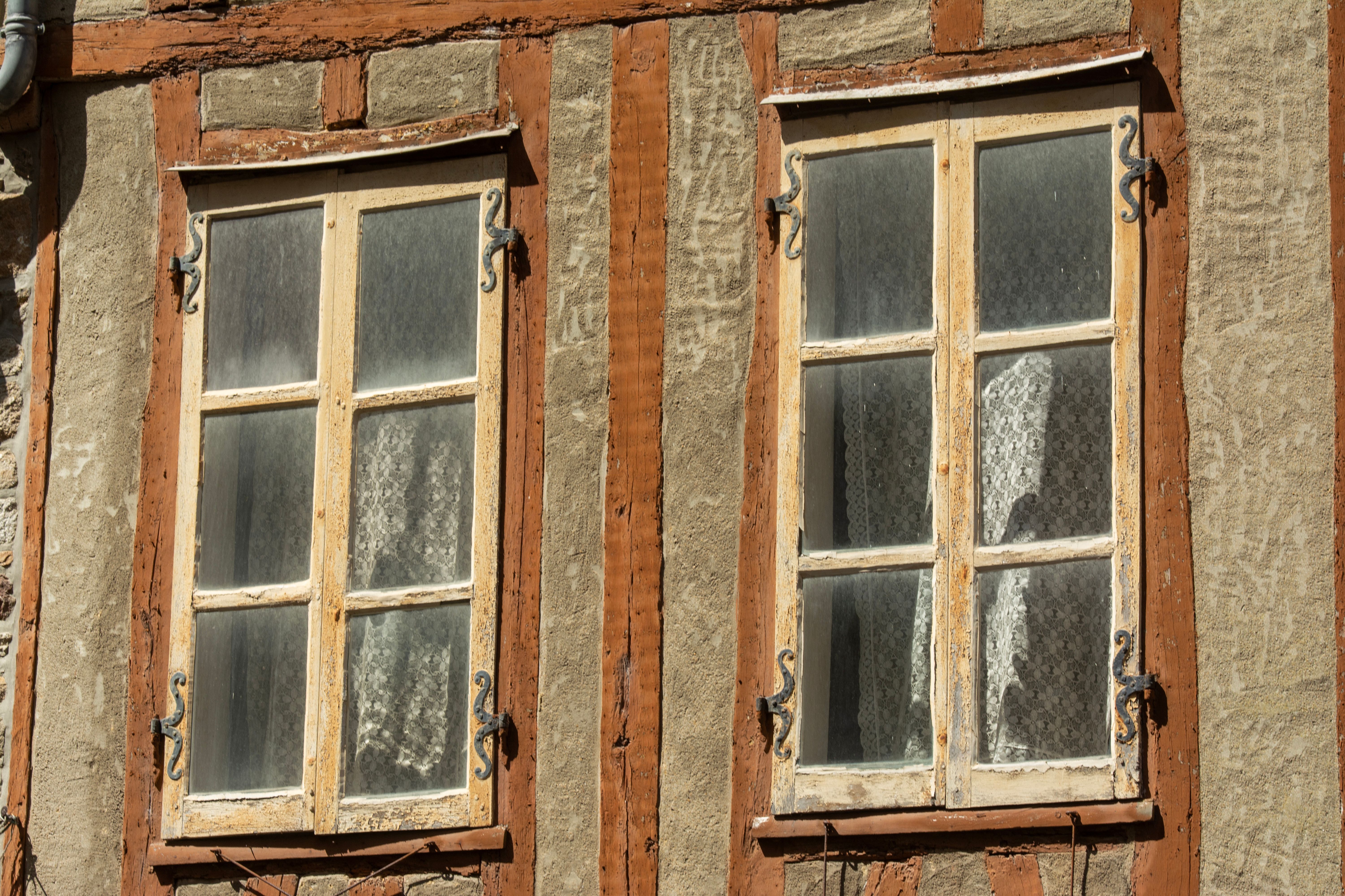diagram comparing a wooden window frame to a movable window sash inside a home