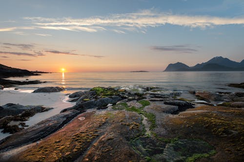 Sunset over the Sea and Mountains 