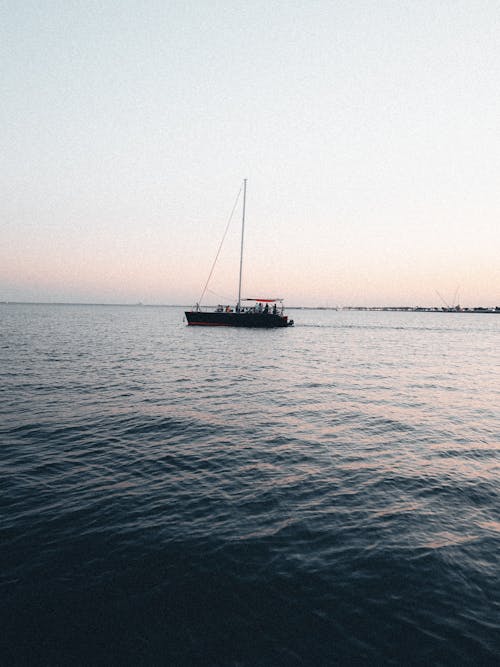 Photos gratuites de bateau, coucher de soleil, eau