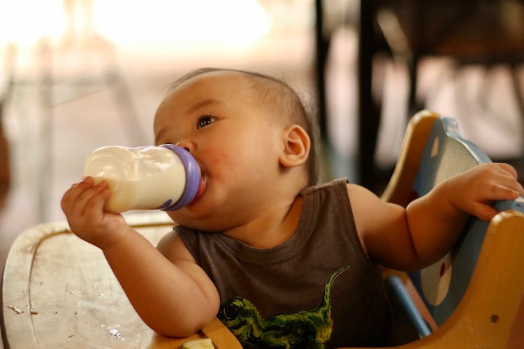 Baby Drinking Milk From Bottle