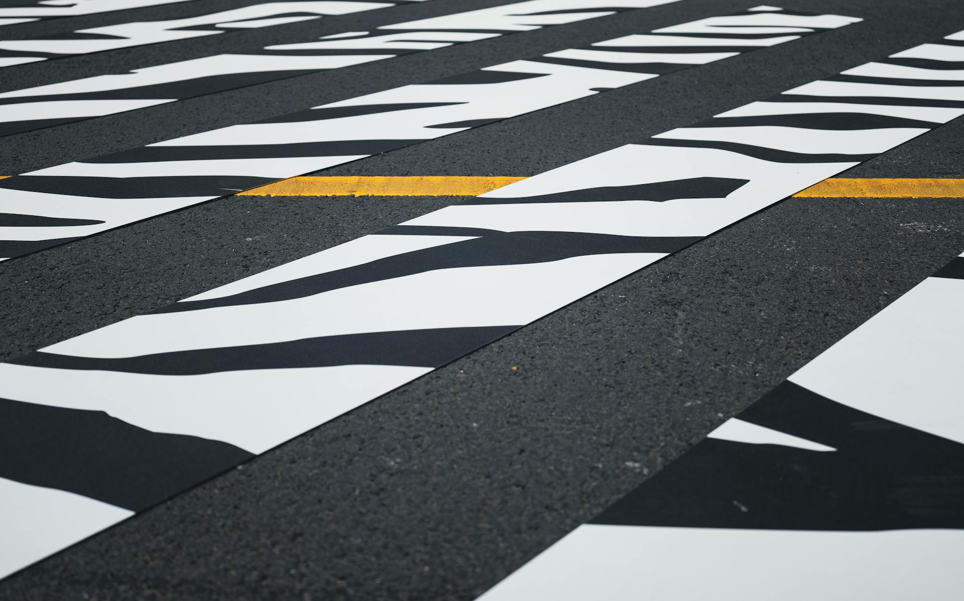 Close-up of abstract road markings in Shanghai, China, showcasing urban street art.