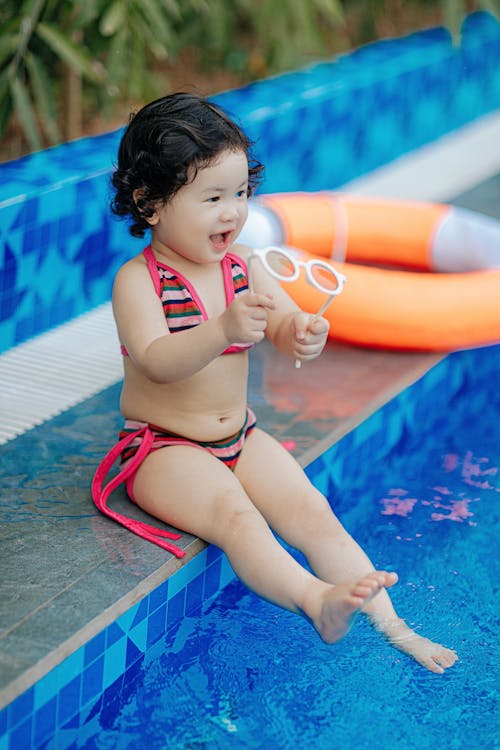 Foto profissional grátis de água, cabelo curto, criança