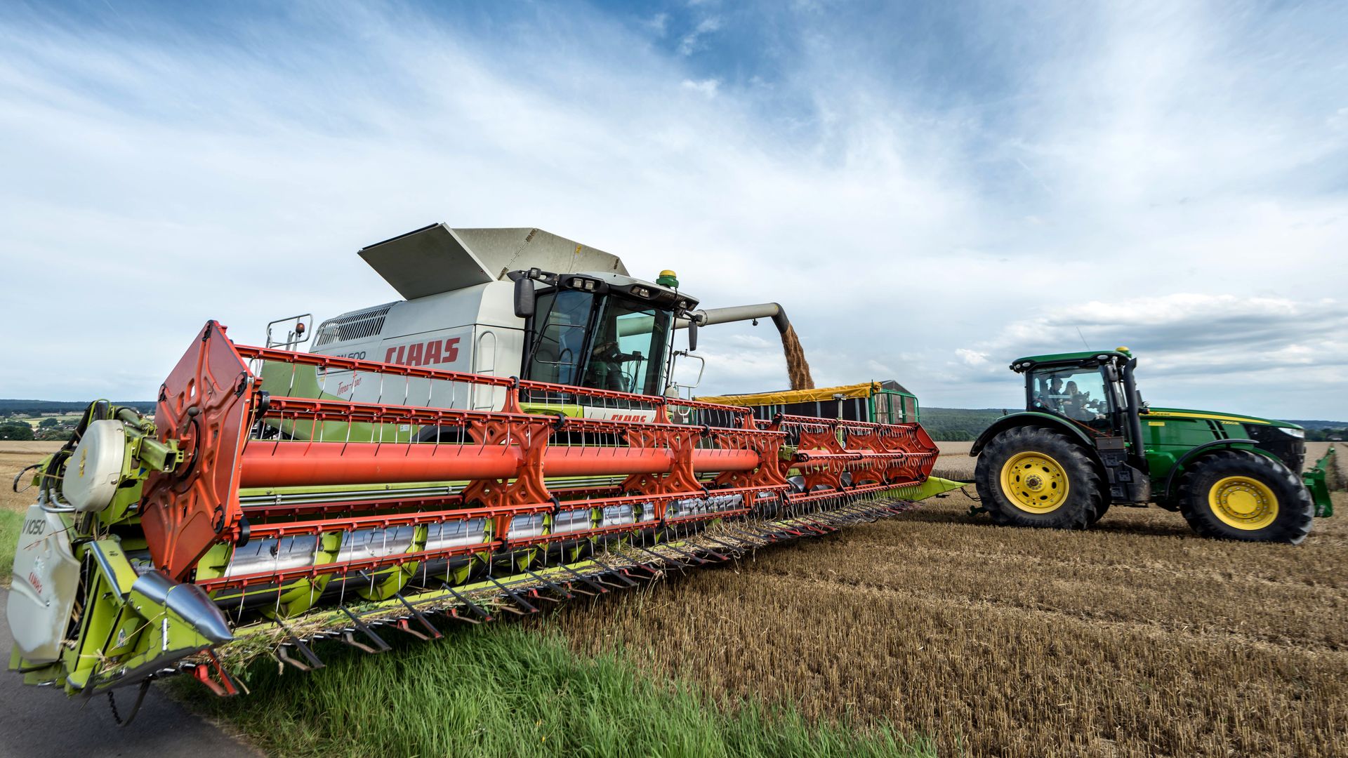 Modafinil and SSRIs Combined: Exploring Interactions and Benefits A combine harvester and tractor in action on a wheat field in Höxter, Germany — modafinil and SSRIs combined