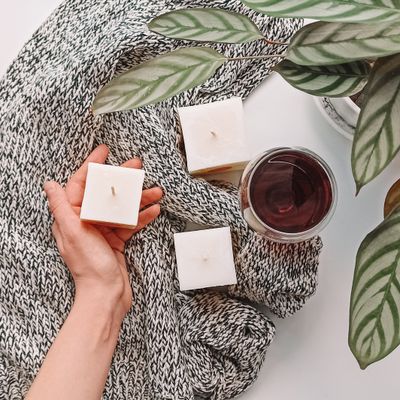Hand-poured soy candle in a ribbed glass jar — photo by Катерина Сокол on Pexels