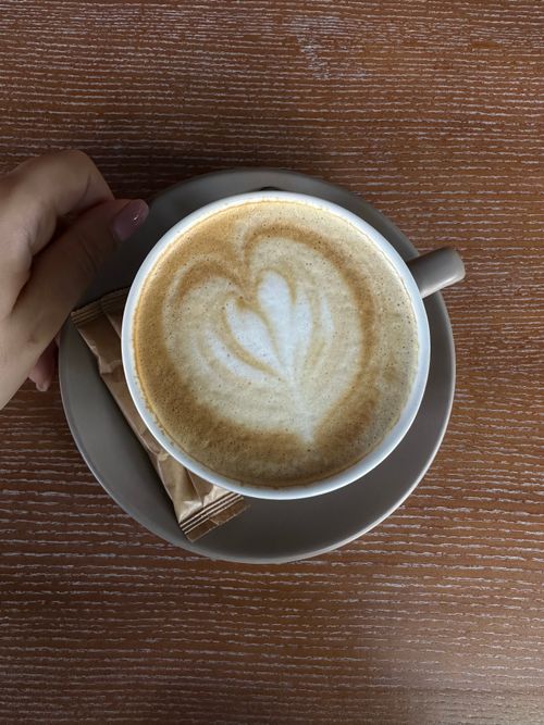 Free Close-up top view of a latte with heart-shaped foam in Odessa, Ukraine. Stock Photo