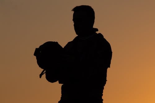 Silhouette of Man at Dawn