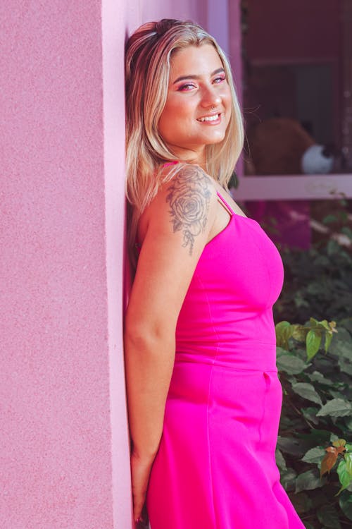 Blonde Woman in Pink Dress
