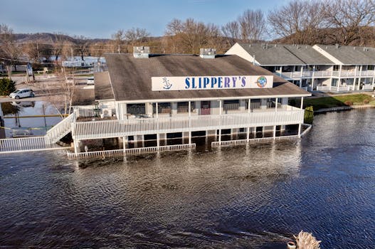 Quaint riverside restaurant and bar captured from above in Wabasha, MN, USA.