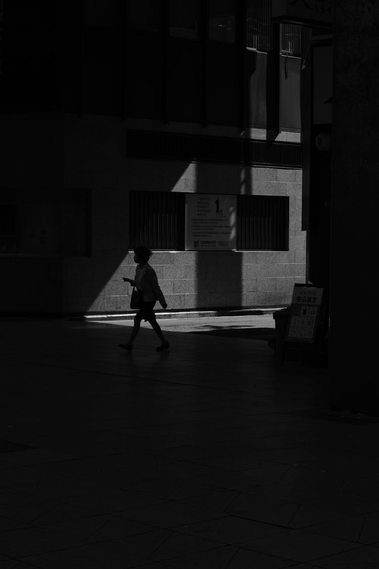 Silhouette Of Pedestrian In City