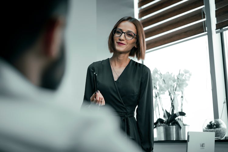 Elegant Businesswoman During Meeting In Office