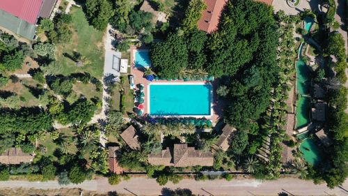Free Drone shot capturing a stunning residential area with a large pool in Antalya, Türkiye. Stock Photo