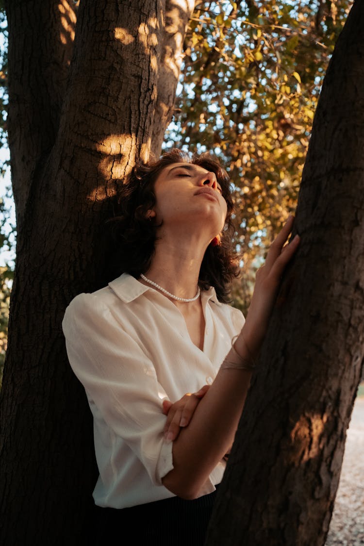 Woman Between Tree Boughs