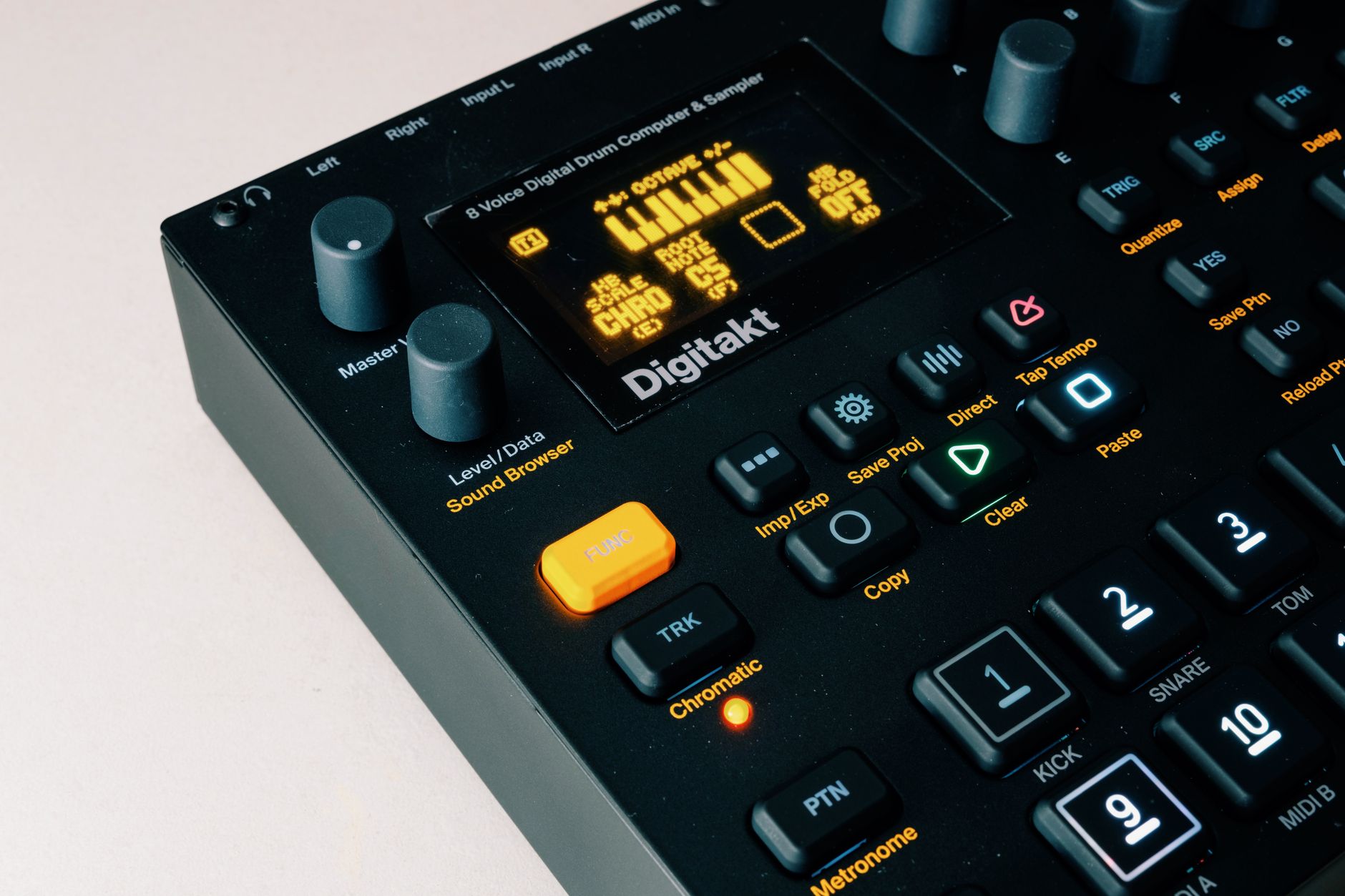 Machine Groove Detail Close-up of drum machine pads and synth controls for EDM production
