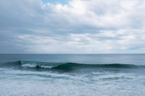 Free Peaceful seascape with gentle waves and cloudy sky in Alanya, capturing nature's tranquility. Stock Photo