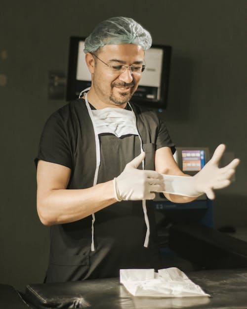 Smiling Doctor Wearing Gloves