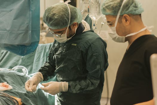 Two surgeons focused on a medical procedure in an operating room, highlighting teamwork in healthcare.